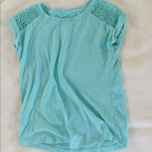 Blue shirt with bow ring and a necklace